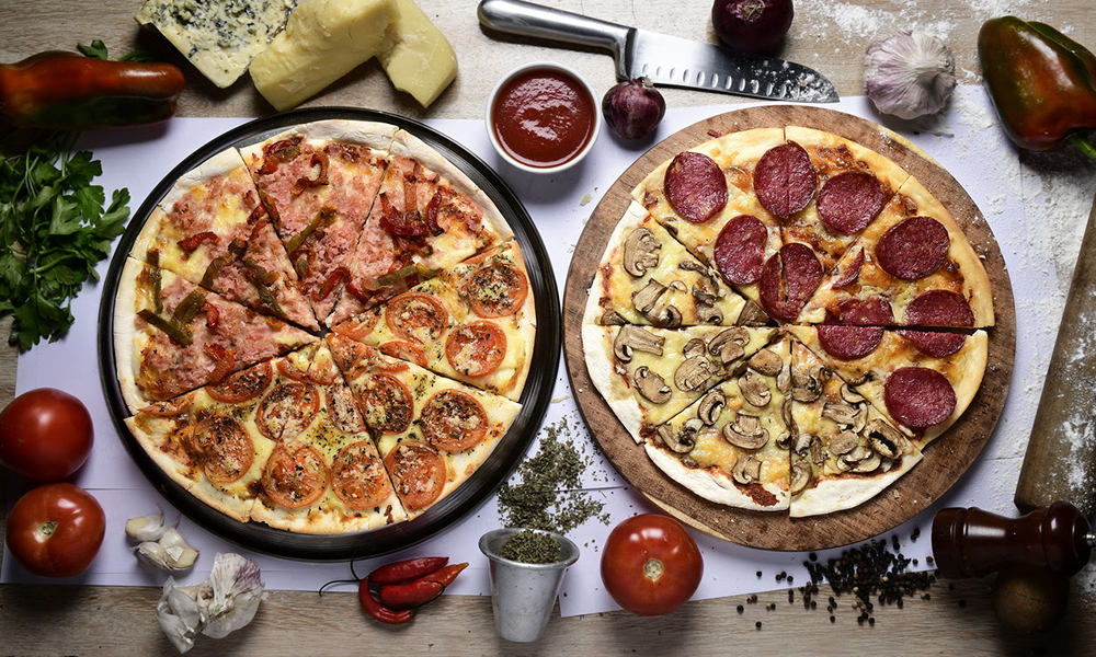 Pizzas personalizadas, pizzas clásicas y empanadas con salsas en iL Salvatore